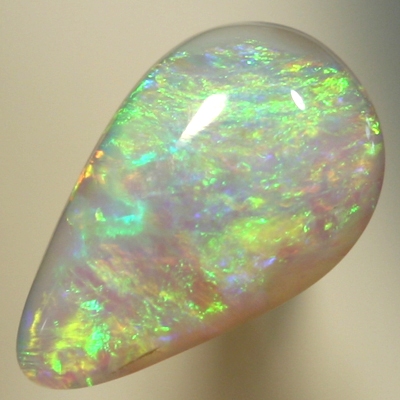 SOLID SEMI BLACK OPAL Orange and green swirls of fire, always showing colour